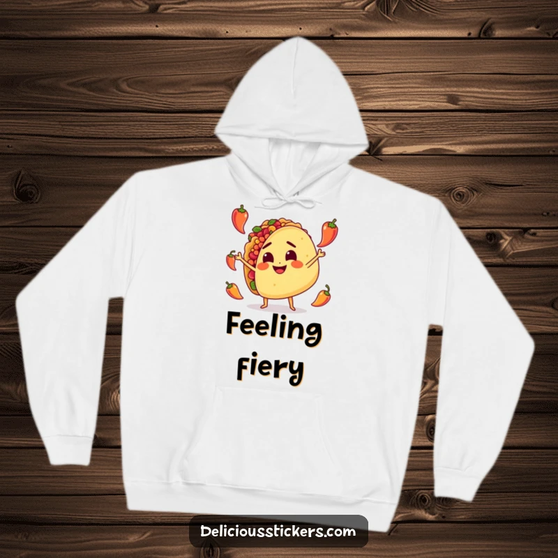 Funny Hoodie: A determined taco character enthusiastically juggles tiny peppers, radiating warmth and a spicy sense of humor.