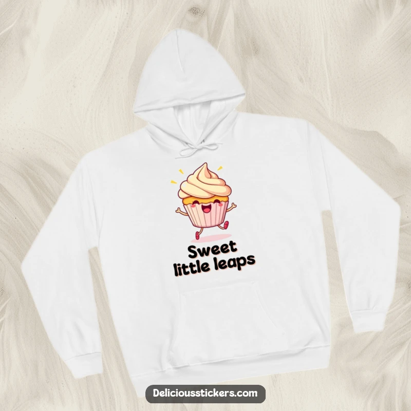 Funny Hoodie: A beaming cupcake character doing a little hop, radiating cartoon joy and cozy vibes.