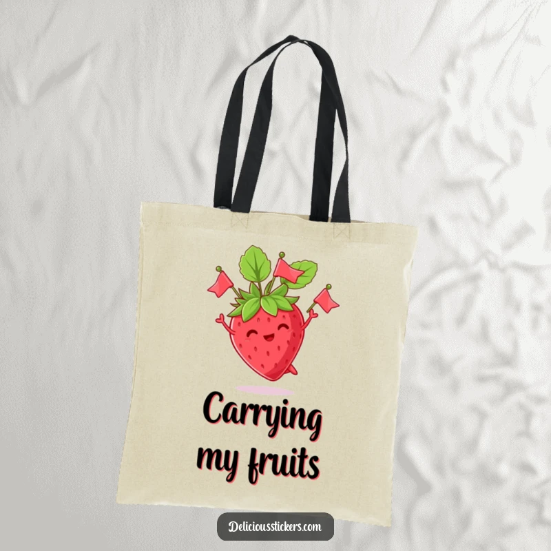 Funny tote bag featuring a gleeful strawberry juggling its leaves as tiny flags, designed for stylish and humorous everyday use.